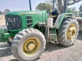 john-deere-new-holland-tractors-small-0